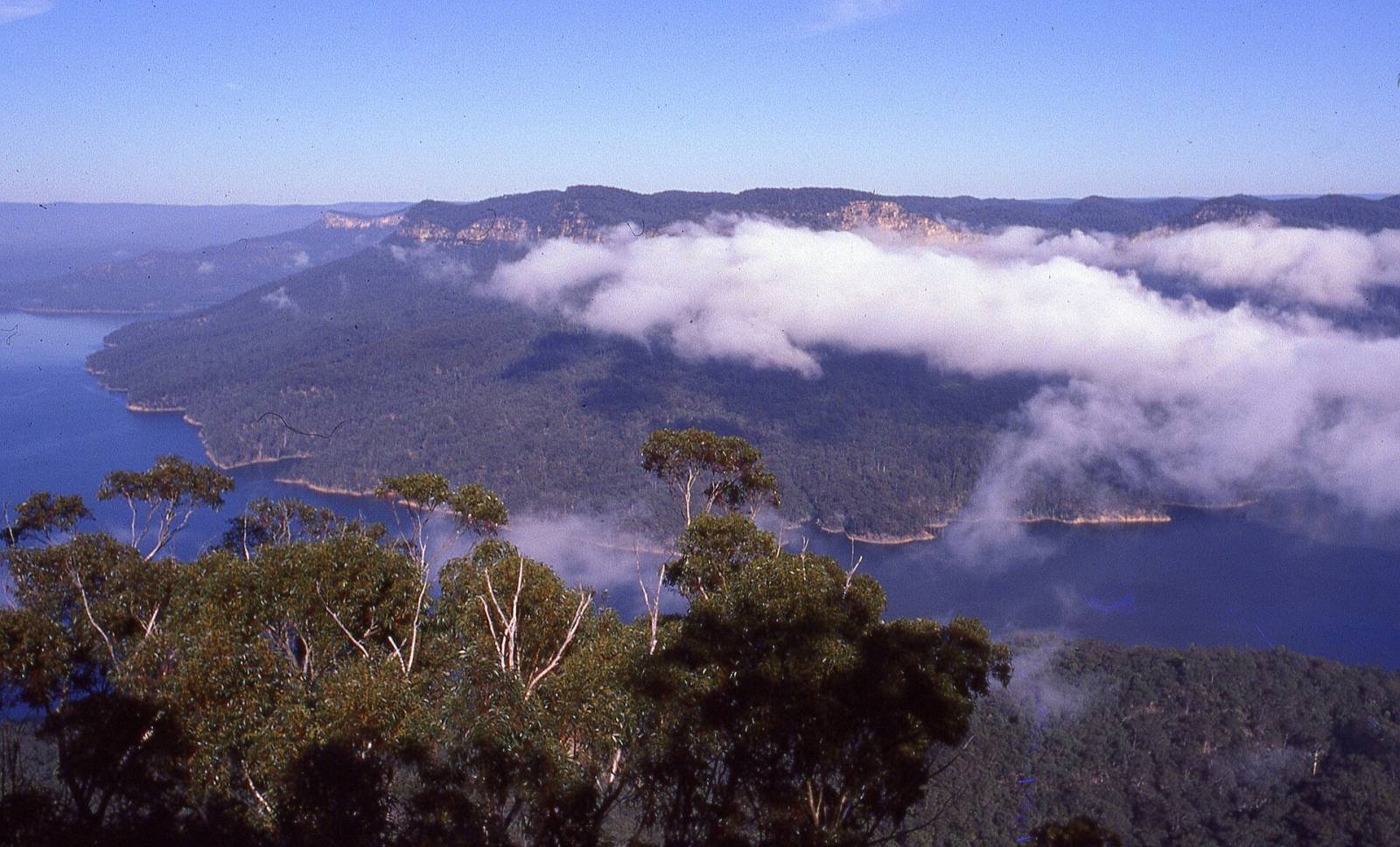 Morning light over Lake Burragorang and the forested ridges of the Blue Mountains