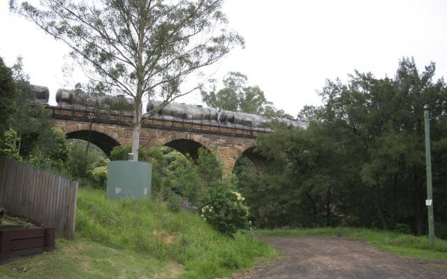 The sandstone arches of the Picton railway viaduct over Stonequarry Creek